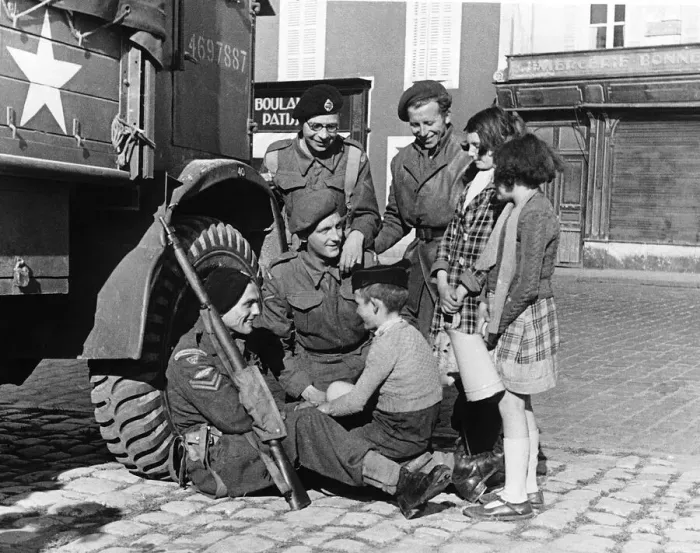 Framed Print : WW2 troops with French children Bayeaux Jul 44 in France children asking for Framed Print : WW2 troops with French children Bayeaux Jul 44 in France children asking for