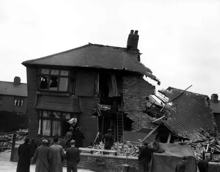 Framed Print : WW2 York Air Raid Bomb Damage Civilians and rescue workers search through a bomb