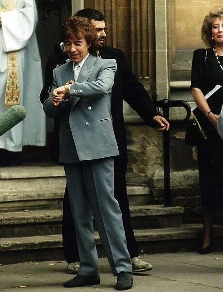 Bill Wyman of Rolling Stones waits for bride Mandy Smith on wedding day 5th June 1989