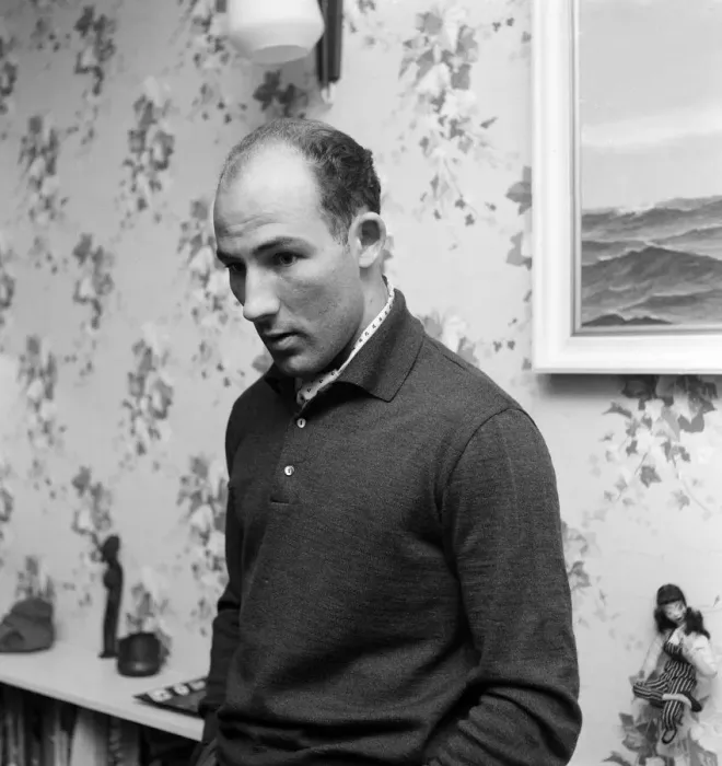 Framed Print : Y2K Stirling Moss 1960 racing driver at his home in Shepherd Street Mayfair London
