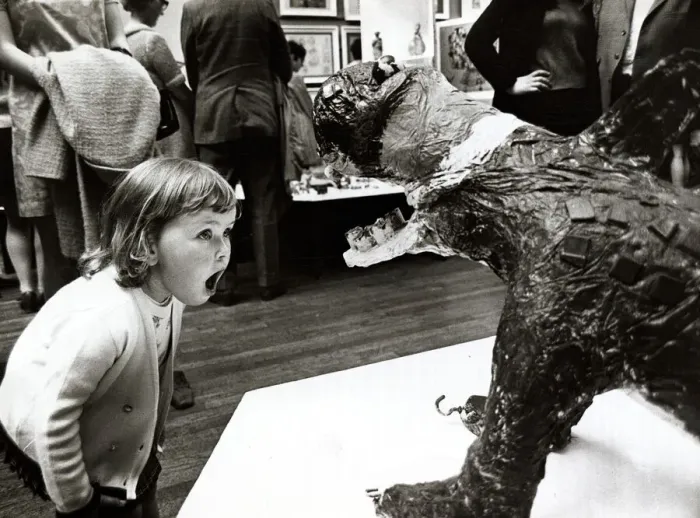 Framed Print : Three year old Cheryl Thomas looking at a sculptured monster at the National Exhibition Framed Print : Three year old Cheryl Thomas looking at a sculptured monster at the National Exhibition