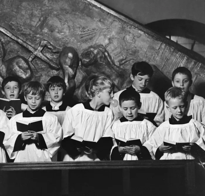 Framed Print : Ten year old choirboy Ian Stacey of Bethnal Green tries to break the concentration of his Framed Print : Ten year old choirboy Ian Stacey of Bethnal Green tries to break the concentration of his