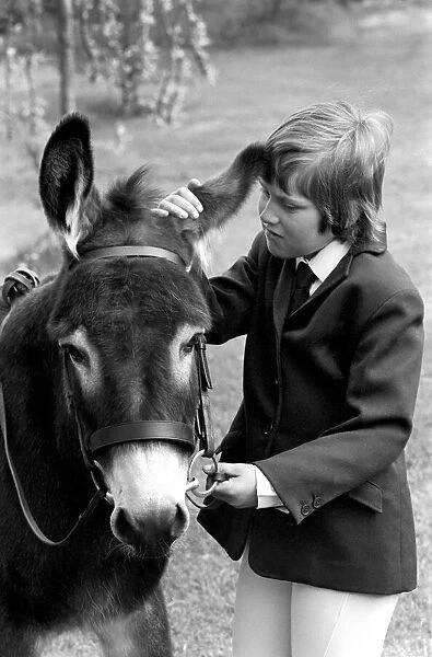 Nine year old girl on her donkey at the Donkey racing championships May 1975
