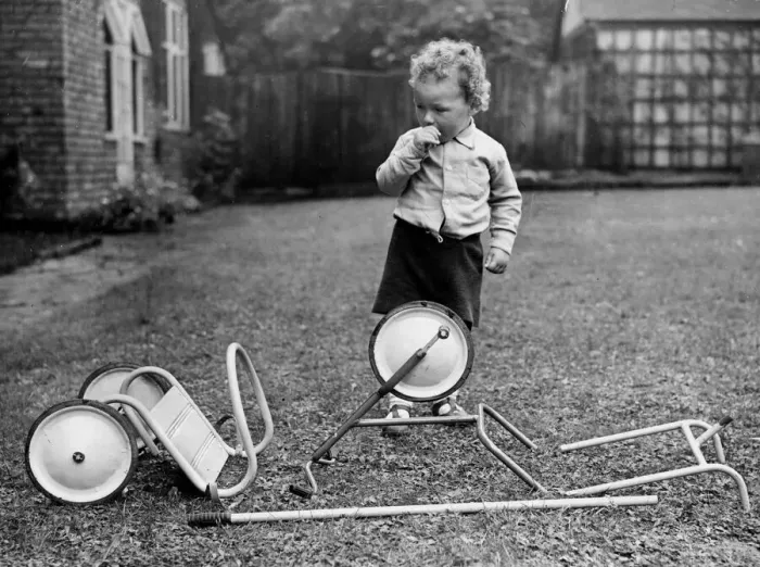 Framed Print : Two year old Paul Chapman of Manchester looks puzzled by the bits Framed Print : Two year old Paul Chapman of Manchester looks puzzled by the bits
