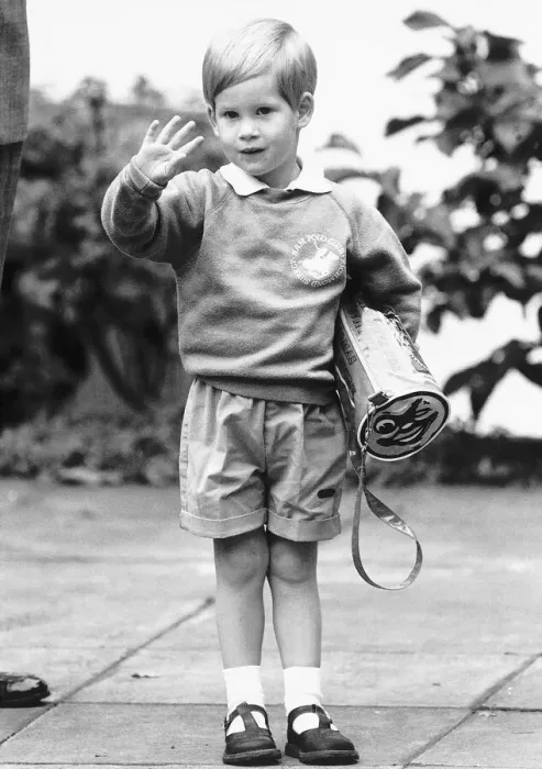 Framed Print : Three year old Prince Harry waves to the waiting croud on his first day at the nursery