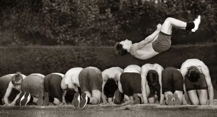 Framed Print : Fifteen year old Ronnie Laing leaping over a dozen of his colleagues in training for next Framed Print : Fifteen year old Ronnie Laing leaping over a dozen of his colleagues in training for next