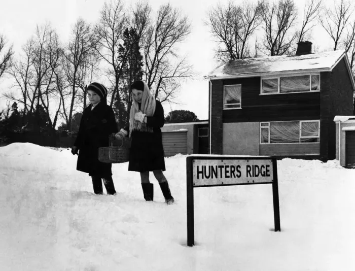 Framed Print : Eleven year old Thomasina Deere and her brother David brave the cold conditions to go Framed Print : Eleven year old Thomasina Deere and her brother David brave the cold conditions to go