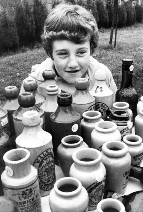 Framed Print : Ten year old Tracy Milles looks after her dads bottle stall Framed Print : Ten year old Tracy Milles looks after her dads bottle stall