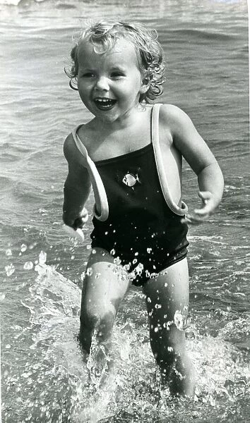 Three year old Victorial Hill, of Rowlands Gill, enjoys a splash in the sea at Tynemouth