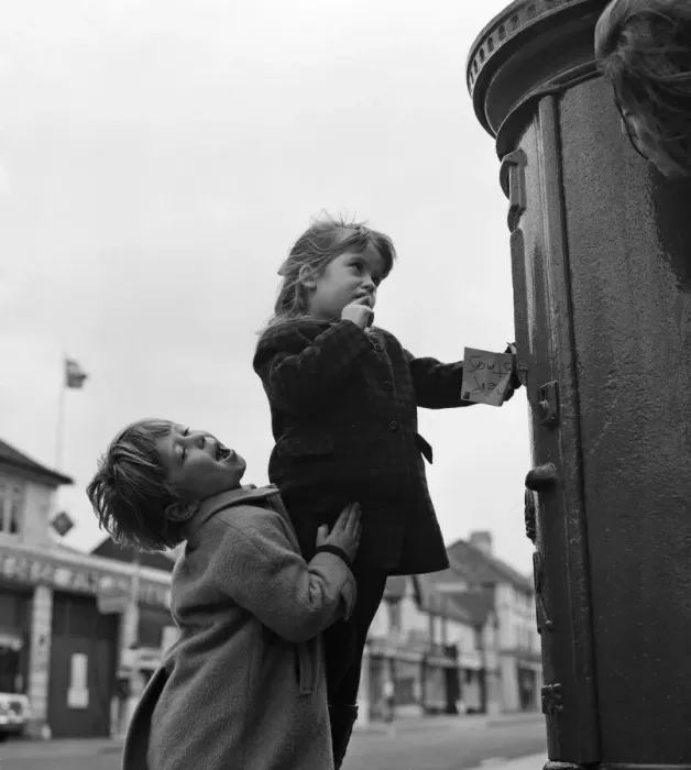 Framed Print : Two four year olds making sure that Father Christmas gets that letter in time Framed Print : Two four year olds making sure that Father Christmas gets that letter in time