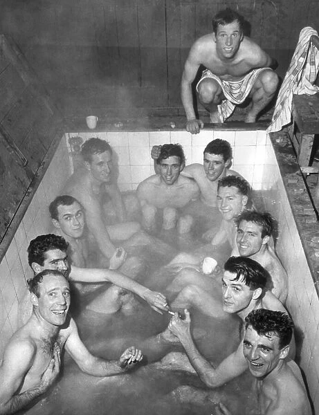 Yeovil Town football players enjoy a team bath as they celebrate winning FA Cup match