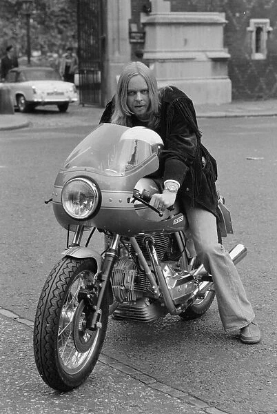 Yes keyboard player Rick Wakeman seen here riding a motorcycle