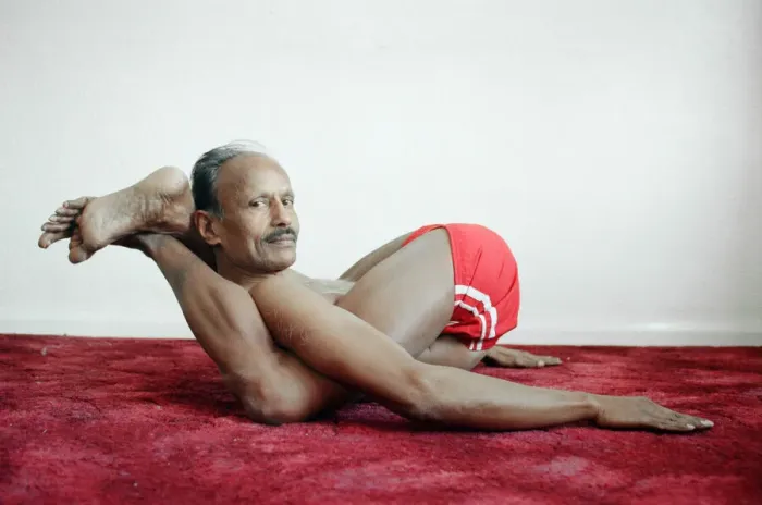 Framed Print : Yoga positions. Position is called Feet behind Neck (Dvi Pada Sirsasana Framed Print : Yoga positions. Position is called Feet behind Neck (Dvi Pada Sirsasana