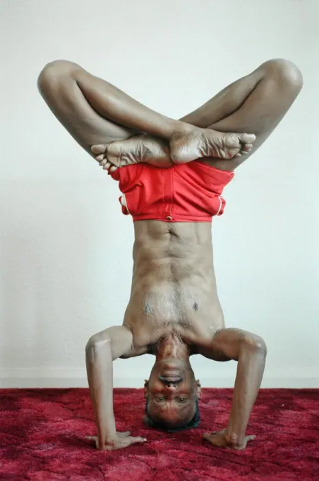 Framed Print : Yoga positions. Position is called Lotus in Tripod Headstand Framed Print : Yoga positions. Position is called Lotus in Tripod Headstand
