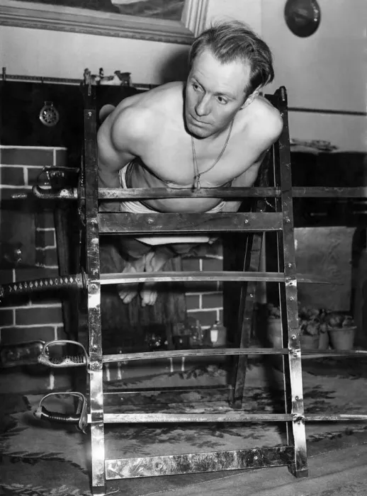 Framed Print : Yogi Special: Albert Buxton seen here balancing on swords. November 1953 P005252