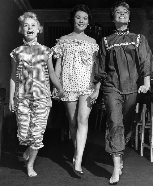 A young Barbara Windsor (left) with two other female models in nightwear