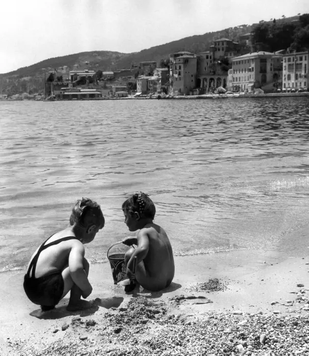Framed Print : Young boy and girl playing on the beach at Villefranche, Alpes Maritime, France Framed Print : Young boy and girl playing on the beach at Villefranche, Alpes Maritime, France