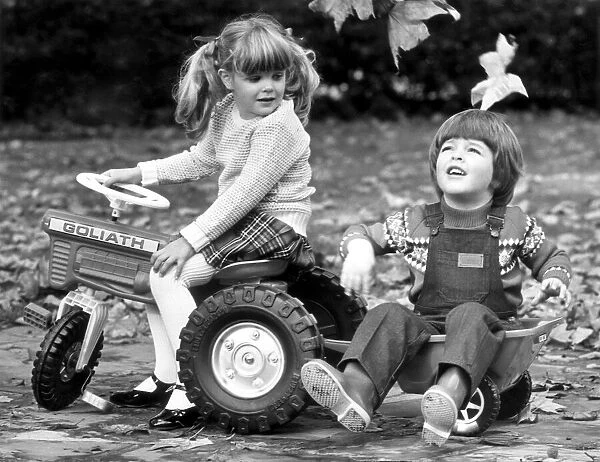 Young boy and girl wearing wellies. 7th October 1980