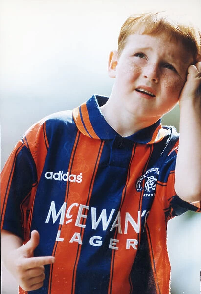 Young boy in rangers away strip 1993
