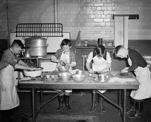 Young boys cooking during Second World War. c. 1940