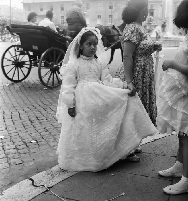 Framed Print : Young child pictured on her way to her First Communion, Rome, Italy Framed Print : Young child pictured on her way to her First Communion, Rome, Italy