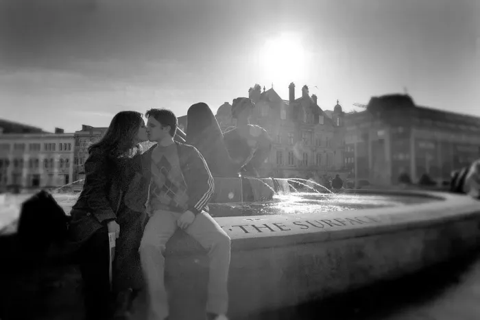 Framed Print : A young couple take advantage of the unusual warm weather in Victoria Square Framed Print : A young couple take advantage of the unusual warm weather in Victoria Square