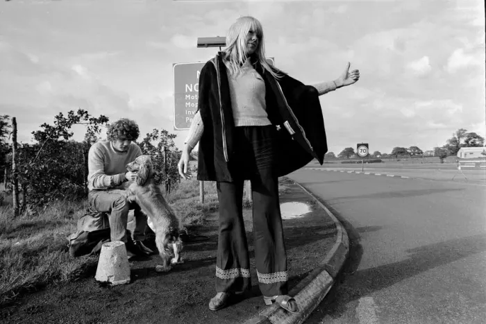 Framed Print : A young couple and their dog trying to hitch a lift on the motorway September 1970 Framed Print : A young couple and their dog trying to hitch a lift on the motorway September 1970