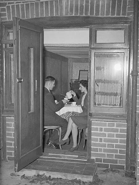 A young couple seen here taking afternoon tea. 30th October 1946