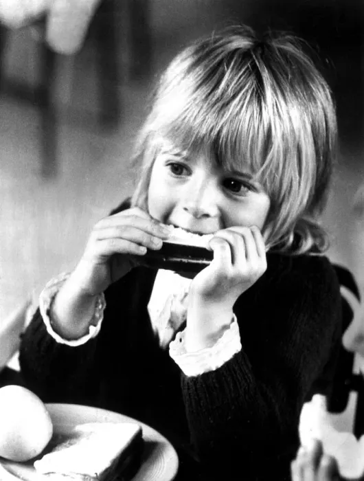 Framed Print : Young girl eating her lunch at school. 30th September 1971 Framed Print : Young girl eating her lunch at school. 30th September 1971