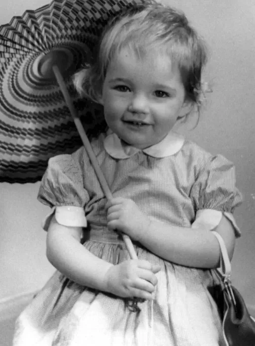 Framed Print : Young girl holding up a parasol Circa 1945 P044459 Framed Print : Young girl holding up a parasol Circa 1945 P044459
