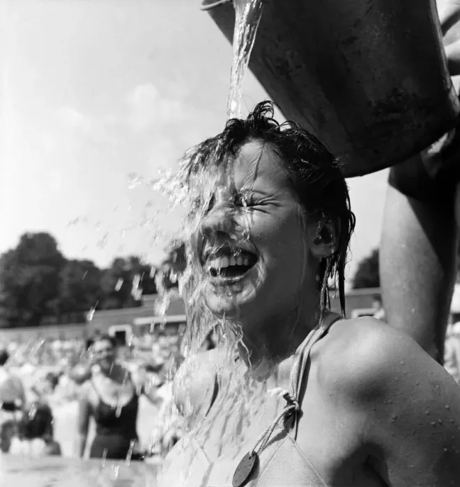 Framed Print : Young girl keeps cool during the hot weather. July 1952 C3326