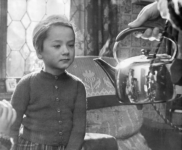 A young girl learns about the dangers of boiling water and kettles