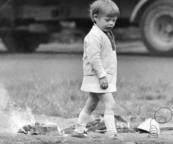 Framed Print : A young girl risks injury playing with fire on wasteland 01 / 11 / 72circa Framed Print : A young girl risks injury playing with fire on wasteland 01 / 11 / 72circa