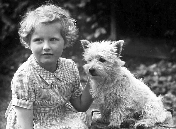 Young girl sitting with dog. c. 1945 P044480