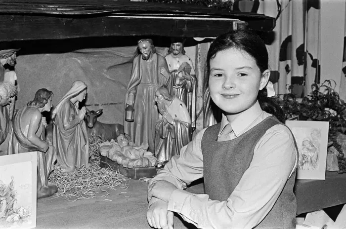 Framed Print : A young girl standing next to a Christmas Nativity scene. Teesside, December 1985 Framed Print : A young girl standing next to a Christmas Nativity scene. Teesside, December 1985