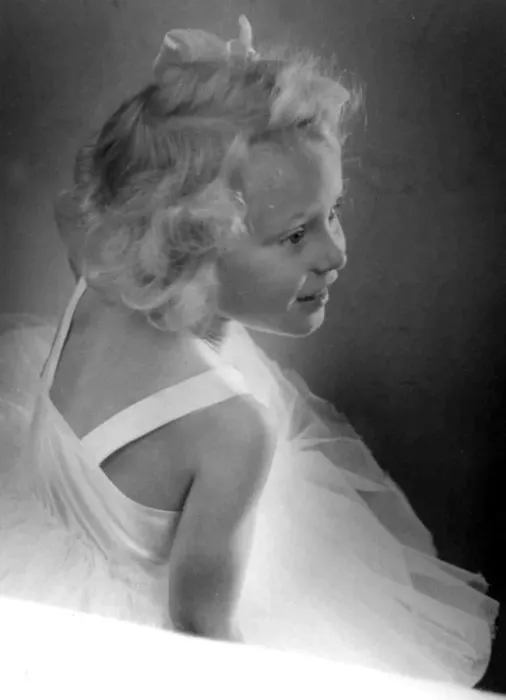 Framed Print : Young girl wearing a white dress Circa 1945 P044466