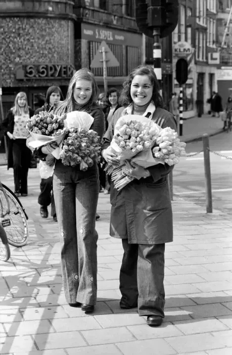 Framed Print : Two young girls of Amsterdam holding bunches of tulips during the season May 1975 Framed Print : Two young girls of Amsterdam holding bunches of tulips during the season May 1975