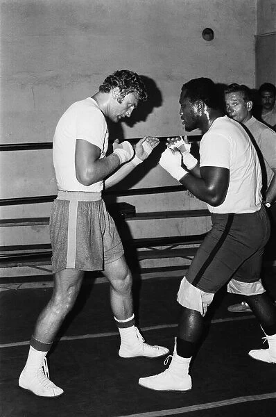 A young Joe Bugner going through his paces with World Heavyweight Champ Joe Frazier