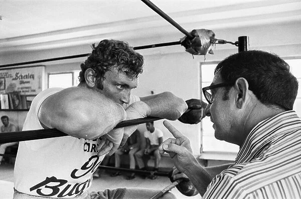 A young Joe Bugner (left) with boxing trainer Angelo Dundee in a New York gym