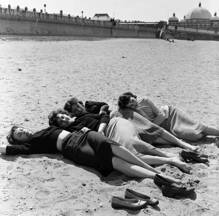 Framed Print : These young ladies, office workers, took a lunch hour paddle at Rhyl which has its Framed Print : These young ladies, office workers, took a lunch hour paddle at Rhyl which has its
