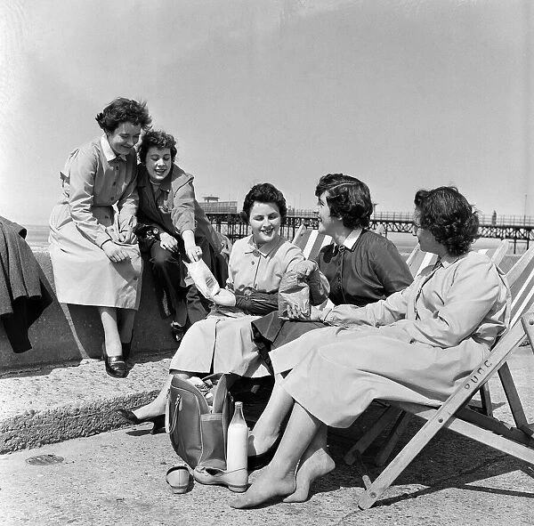These young ladies from Rhyl decided to have a picnic lunch on the prom in the lovely