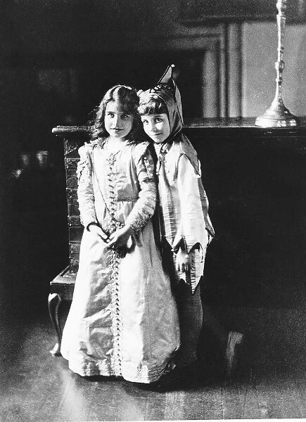 The young Lady Elizabeth Bowes-Lyon, aged 9, with brother David at Glamis Castle