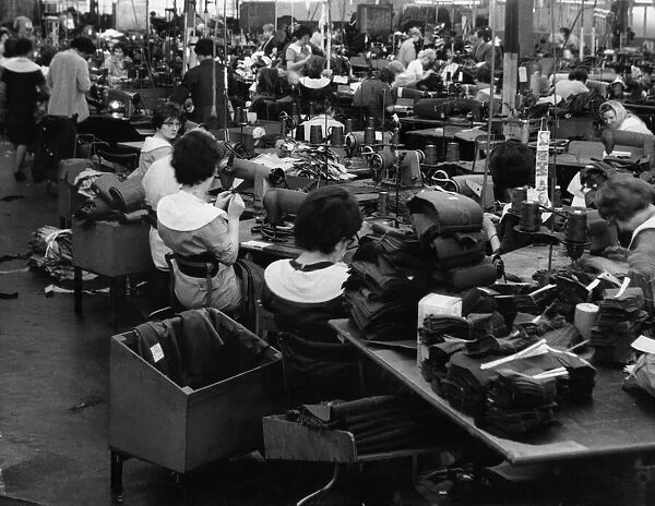Young machinists at work on one of the production lines at Lotery