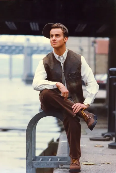 Framed Print : A young man posing in the latest styles
