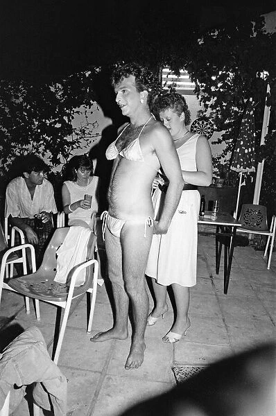 Young people on holiday in Corfu on a Club 18-30 holiday. The drag queen contest
