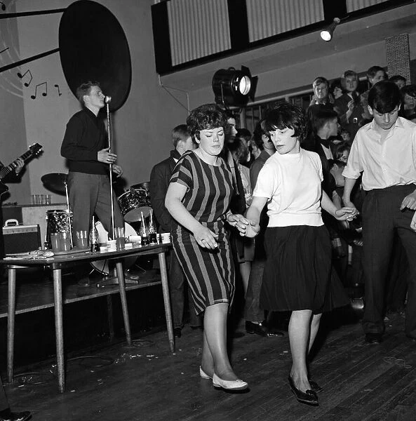 Young people taking part in a twisting dance competition. 11th February 1962