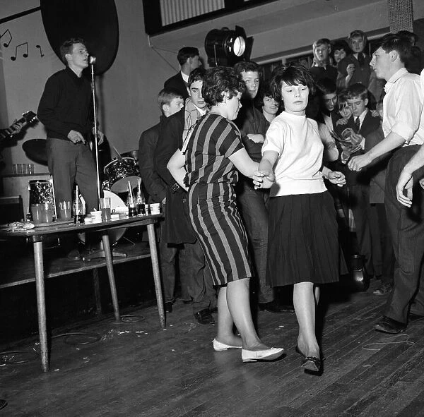 Young people taking part in a twisting dance competition. 11th February 1962