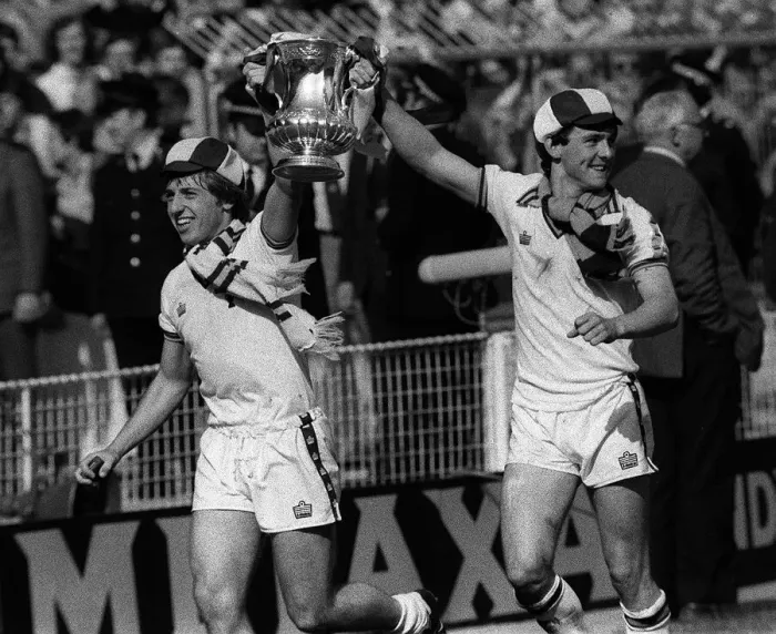 Framed Print : Young seventeen years old Paul Allen (right) leads the way with the FA Cup after West Ham