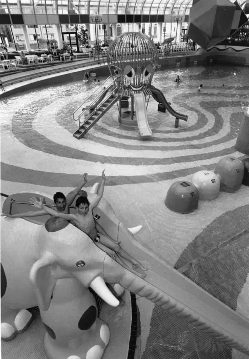 Framed Print : Two young visitors enjoys the Elephant water chute at Rhyl Suncentre. 23rd May 1996 Framed Print : Two young visitors enjoys the Elephant water chute at Rhyl Suncentre. 23rd May 1996