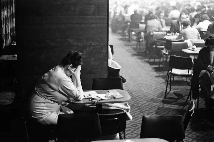 Framed Print : The young and the not so young mix as they get eyes down